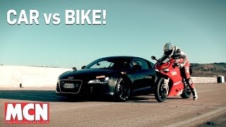 Car Audi R8 vs Bike Ducati Panigale 1199R  Feature  Motorcyclenewscom [upl. by Ahtimat]