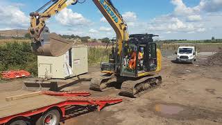 Loading excavator on to trailer [upl. by Anirak653]