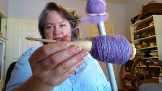 Quick demo of Scottish spindle and distaff [upl. by Ttirrej]