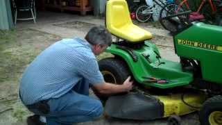 Removing wheel from John Deere Garden Tractor [upl. by Judith]