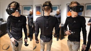 This Haptic Suit Lets You Touch and Feel Virtual Reality  Teslasuit [upl. by Maher62]