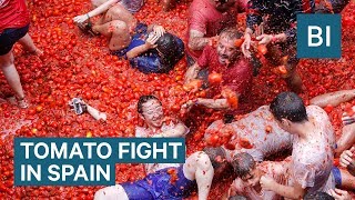 Hundreds Of Tons Of Tomatoes Are Used As Ammo In Spains Tomatina Festival [upl. by Cathee418]