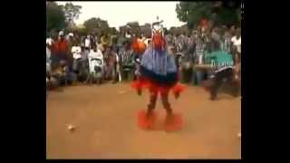 A dancing man on a stick  amazing african tribal dance  Zaouli Dance [upl. by Ahsimrac]