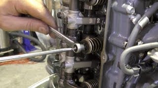 Outboard valve clearance adjustment [upl. by Gaiser480]