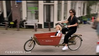 Amsterdam Netherlands Bike Culture  Rick Steves’ Europe Travel Guide  Travel Bite [upl. by Vijnas]