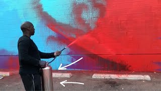 How to Paint Art with a Fire Extinguisher  Street art and Murals [upl. by Ahsikel]